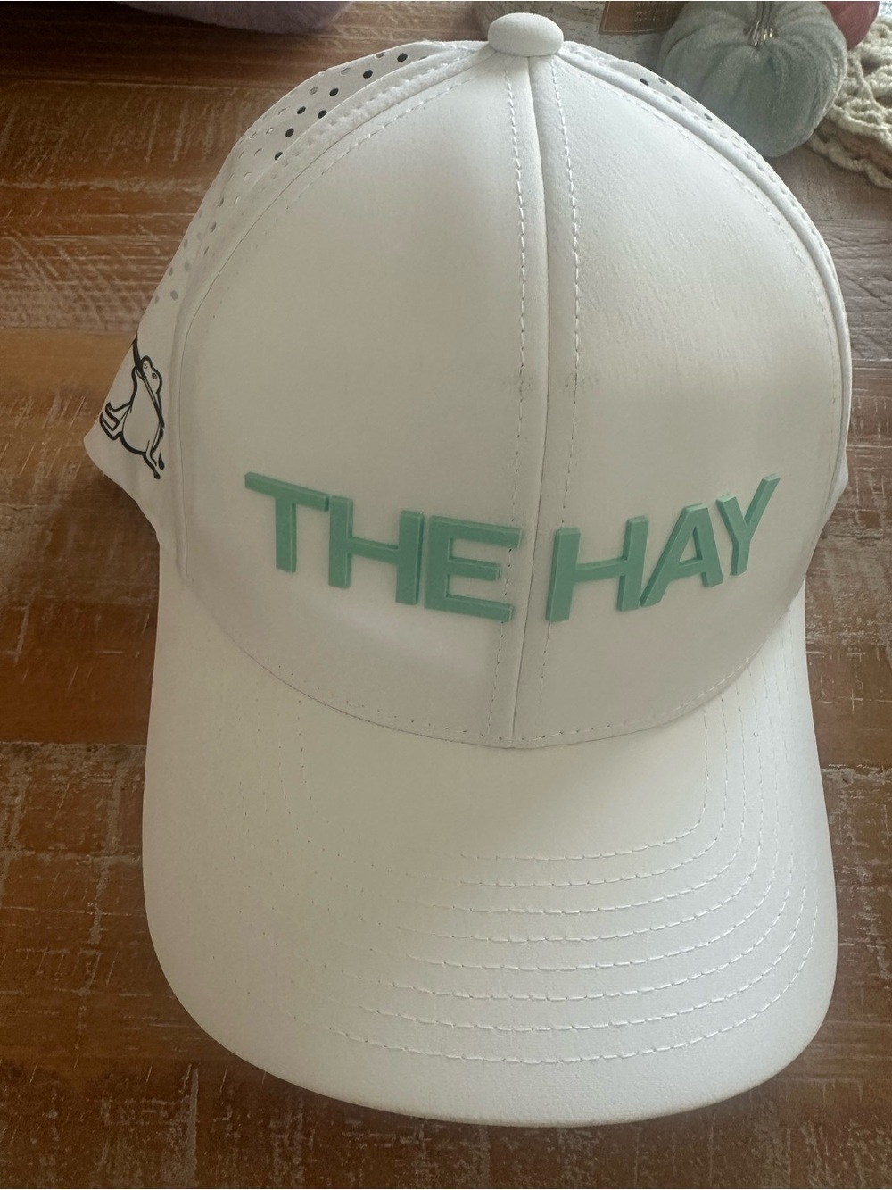The Hay White Baseball Cap with Mint Green Lettering